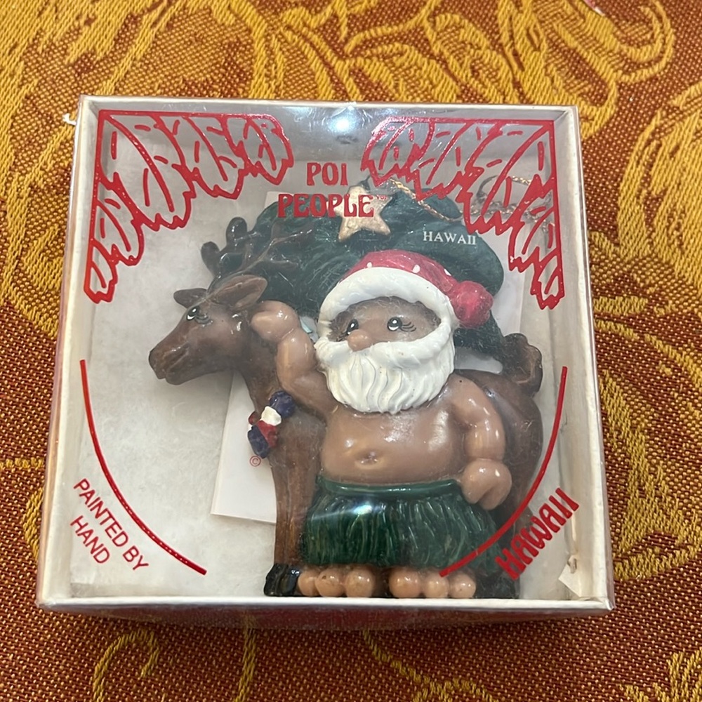 Adorable Hawaiian Santa ornament in original box from Hawaii made out of wood